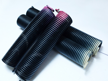 Extension springs for roll-up shutters