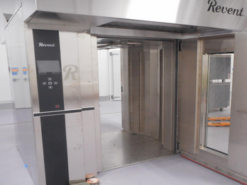 Pass through rack ovens