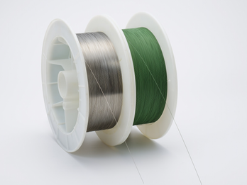Spool wound Pre-straightened wire with PTFE coating