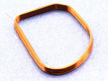 Inductive charging and telemetry coils used in the implant.