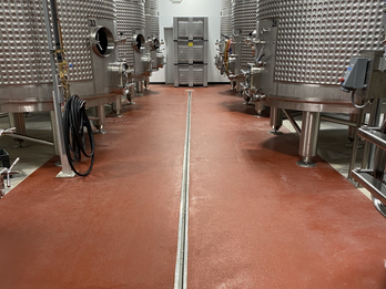 Drain with Epoxy Flooring.