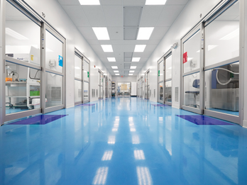 Cleanroom anteroom with doors to 12 discrete manufacturing suites