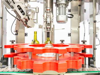 LINEAR CAPPING MACHINE FOR THE WINERY INDUSTRY
