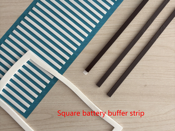 Shock-absorbing buffer strip between square battery cells