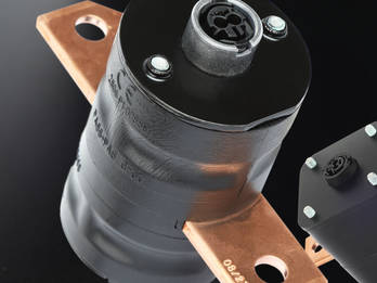 Pyrotechnic actuators for electric and hybrid-electric vehicles