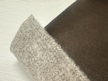 Hybrid construction: aramid felt + PTFE surface